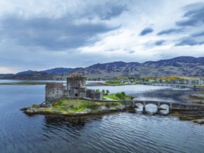 Eilean Donan Castle and Loch Duich from a drone, Isle of Skye, Highlands, Scotland, England, United