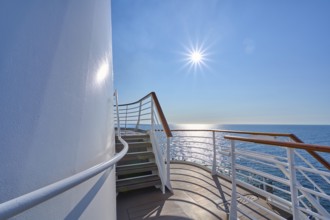 View from the deck of a cruise ship Mein Schiff 6 to the sunny sea and clear sky, North Sea,