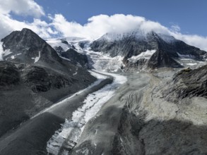 Aerial view, mountain landscape with glacier tongue Glacier de Cheilon and summit Mont Blanc de