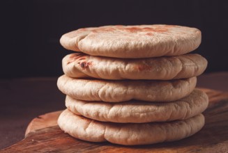 Pita bread, stack, on the table, no people