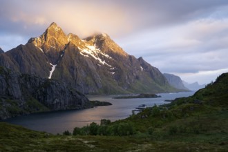 Mountain landscape in the Lofoten Islands. View across the Maervollspollen fjord to mountains in