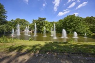 Fountain in a pond in Bochum municipal park, Ruhr district, independent city, North