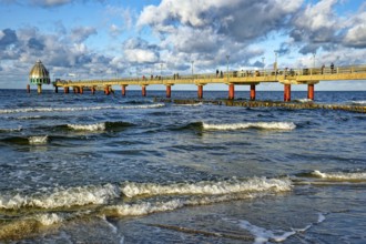 Diving gondola at the Zingst pier, cloudy mood and waves, Baltic Sea coast, Zingst,
