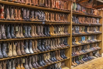 Large variety of cowboy boots for sale at boot store in downtown Nashville, Tennessee, USA, North