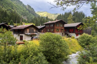 Traditional wooden houses in the mountain village of Fionnay, Val de Bagnes, Valais, Western Alps,