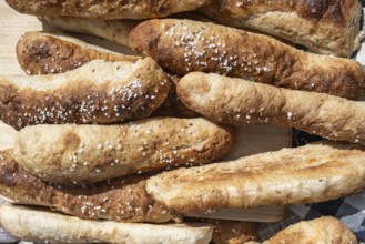 Freshly baked bread, breadsticks, souls with salt and caraway seeds, traditional pastries from