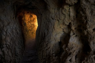 Light at the end of the tunnel, Algar Seco rock formation, coloured rocks and underground caves,