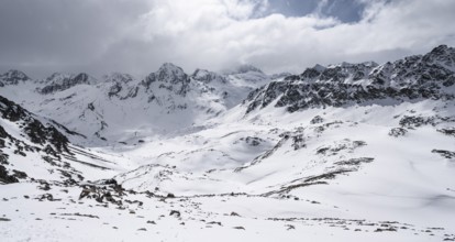 View at the summit of Piz Laviner, mountain panorama in winter, mountain landscape with mountain