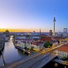 City panorama with Spree, Cathedral, Nikolai Quarter, Red City Hall and TV Tower in the evening,