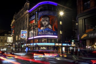 Traffic at night outside the Sondheim Theatre, Les Misérables, Musical, West End, London, England,