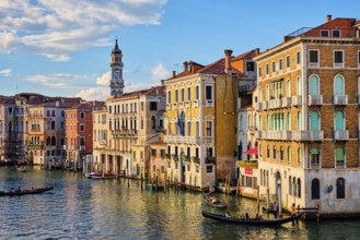 VENICE, ITALY, JUNE 27, 2018: Grand Canal with boats and gondolas on sunset, Venice, Italy, Europe