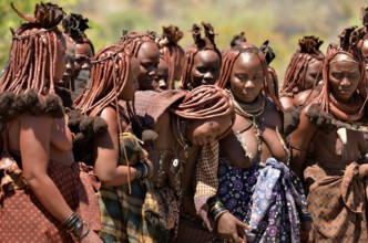 Mourning Himba women at a funeral, the widow in the middle, Omohanja, Kaokoland, Kunene, Namibia,