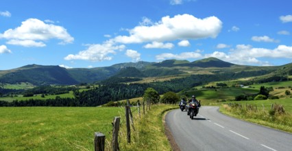 Motorcycle group in Sancy Massif. Auvergne Volcanoes Natural Park. Puy de Dome department. Auvergne
