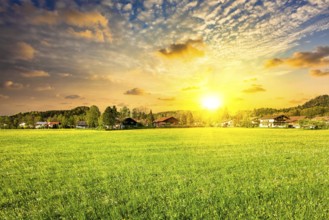 Idyllic rural scene of countryside meadow field on sunset, Germany, Europe