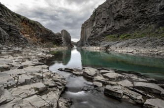 Stuðlagil Canyon, turquoise river between basalt columns, Egilsstadir, Iceland, Europe