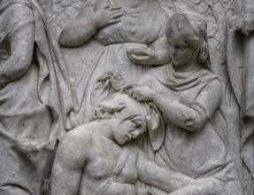Detail photo, figures and sculptures at the base of the Queen Louise Monument, in the Großer