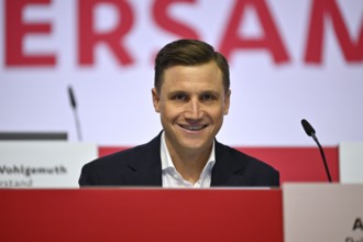 Member of the Executive Committee Andreas Grupp VfB Stuttgart smiles, General Meeting VfB Stuttgart