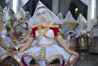 Artistes enacting the role of Gopi as they perform Manipuri Raas Leela Dance in Imphal, Manipur,
