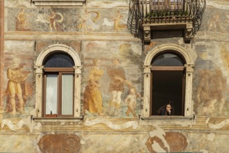 The painted façade of the Case Cazuffi Rella houses on Piazza del Duomo in Trento, Trentino, Italy,