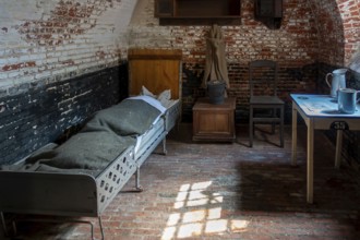Interior of old jail cell at the prison museum at Merksplas near Hoogstraten, province of Antwerp,