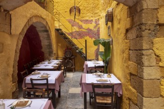 Greece, Chania Island restaurants and cafes. Traditional Greek food in historic center, Europe