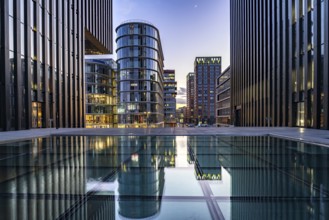 Modern high-rise architecture in the Media Harbour quarter in Düsseldorf at dusk, North