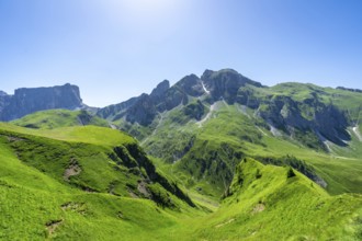 Breathtaking view of the lush green slopes and rugged peaks of passo giau in the italian dolomites