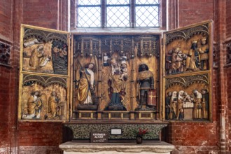 Krämeraltar in the interior of the church of St Nikolai in the Hanseatic city of Wismar,