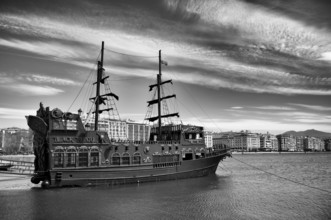Tourist boat, excursion boat Black Pearl anchored, old harbour, view of waterfront, skyline of