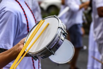 Tambourine player on the streets of Brazil during Carnival, Brazil, South America
