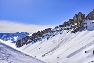 On the right, the rock faces of the Hoher Ifen (2230 m) in Kleinwalsertal, on the Gottesacker