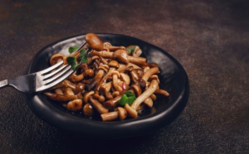 Pickled honey mushrooms, in a bowl, homemade, top view, no people