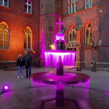 Kevelaer in the light, light installation inner courtyard of the confessional chapel with fountain