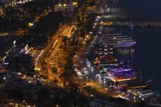 The lights in the harbour of Alanya Turkey shine in the evening, Alanya, Antalya, Turkey, Asia