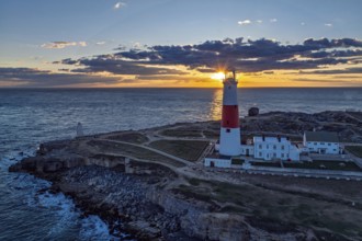 Sunset over Portland Bill Lighthouse from a drone, Portland Bill, Isle of Portland, Dorset,