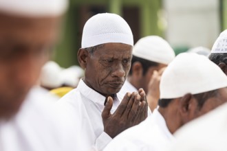 KAYAKUCHI, INDIA - MARCH 31: Muslims perform Eid al-Fitr prayer at Eidgah in Kayakuchi, India on