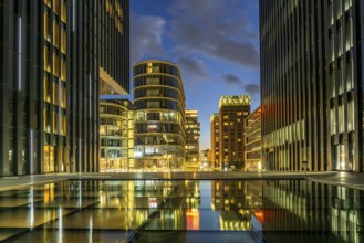 Modern high-rise architecture in the Media Harbour quarter in Düsseldorf at dusk, North