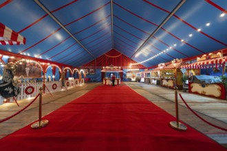 Magnificently decorated circus tent with red carpet inside, Böblingen, Germany, Europe
