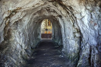 Passage through the hilltop to the burial chapel on the Calvary, Füssen, Ostallgäu, Allgäu, Swabia,