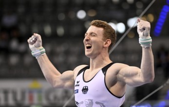 Nils Dunkel GER cheers after routine on rings gymnastics, EnBW DTB-Pokal, Porsche-Arena, Stuttgart,
