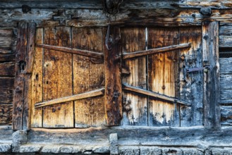 Weathered loading door of an old hay barn, Grimentz, Val d'Anniviers, Valais Alps, Canton Valais,