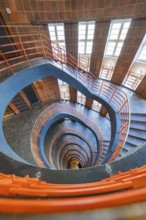Wide-angle shot of a spiral staircase with red banisters, SPRINKENHOF, Hamburg, Germany, Europe