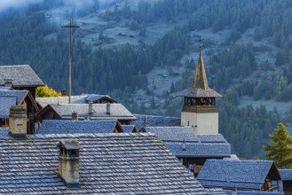 Roofs covered with hoarfrost, fog rising, Grimentz, Val d'Anniviers, Valais Alps, Canton Valais,