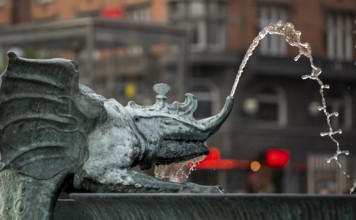 Dragon, bronze statue, fountain, City Hall Square or Rådhuspladsen, Copenhagen, Denmark, Europe
