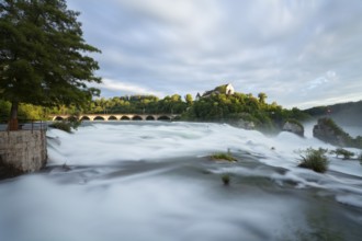 The Rhine Falls at Schaffhausen in Switzerland with Laufen Castle on the Rhine Falls. An extreme