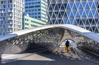 The Parkbruk, cycle and pedestrian bridge in the city centre of Antwerp, crosses a multi-lane city
