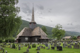 Cemetery and wooden church, Kvam, Upper Gudbrandsdalen, Norway, Europe