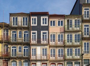 Colorful facades of houses along Cais da Estiva in the Ribeira district, Porto, Portugal, Europe