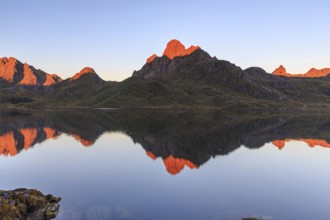 Mountains reflected in fjord, morning light, sunny, autumn, Annfjord, Vesteralen, Norway, Europe