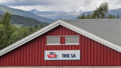 Red building of the Tine dairy, largest dairy in Norway, Dovre, Fylke Innlandet, Upper